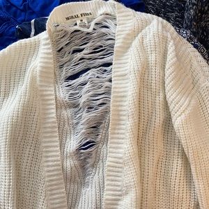 White cardigan with design on back